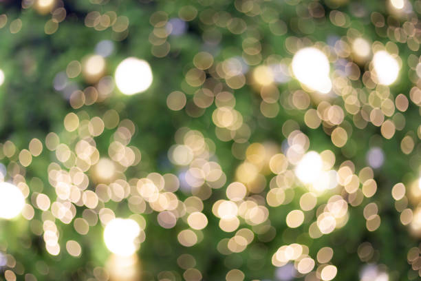 istock Glittering green blurred neon green round lights background 1094079172