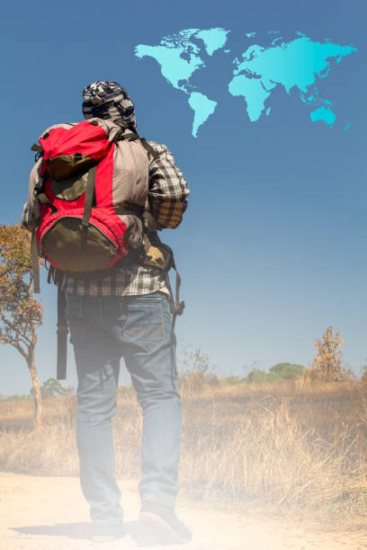 istock Young traveler with his backpack traveling around the world. 1094083328