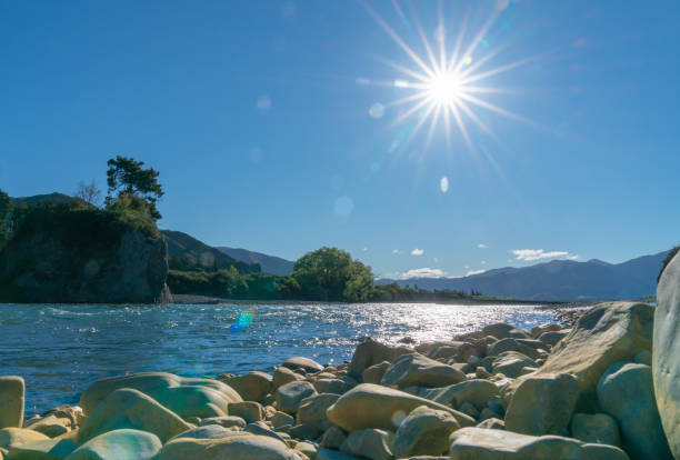 Clean cool fresh water of Waiau River and stony river bed at Hanmer Springs, New Zealand.