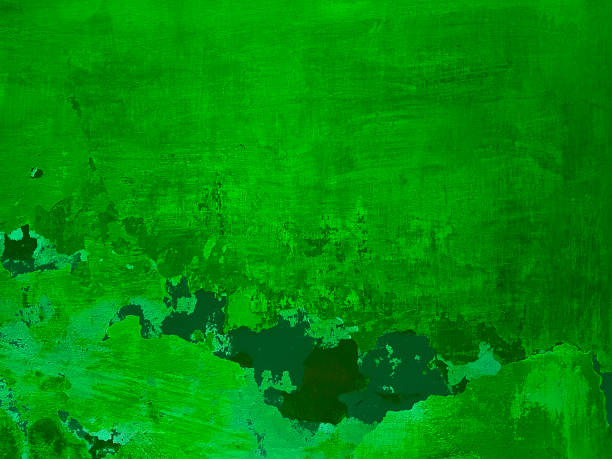 istock Green color grunge wall surface old weathered aged dirty background 1094085332