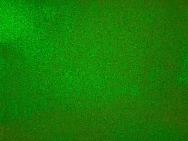 istock Green color grunge wall surface old weathered aged dirty background 1094085638