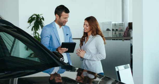 istock Car salesman with a customer 1094093068