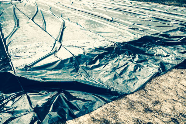 istock Wet Tarp Covering New Concrete Foundation 1094104622