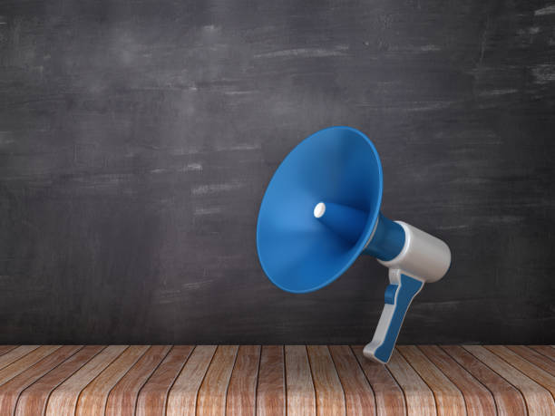 istock Megaphone on Wood Floor - Chalkboard Background - 3D Rendering 1094108536