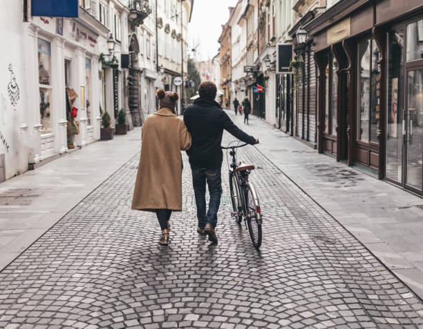 istock cute interracial couple on a walk around the city 1094109556