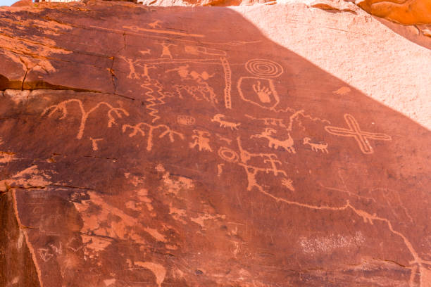istock Rock art symbols cover a boulder in the Red Rock Canyon. 1094110932