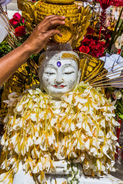 istock watering buddha statue Shwedagon Pagoda  Yangon  Myanmar 1094113430
