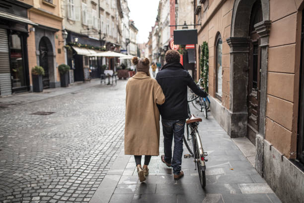 istock cute interracial couple on a walk around the city 1094113474