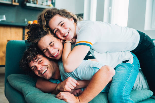 Happy father with teenagers Laughing with Family sister stock pictures, royalty-free photos & images