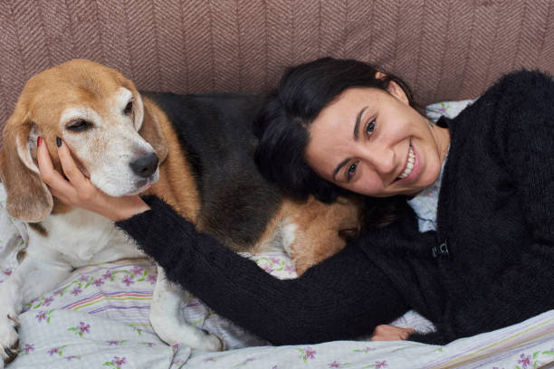 istock young woman and her Beagle dog 1094115910