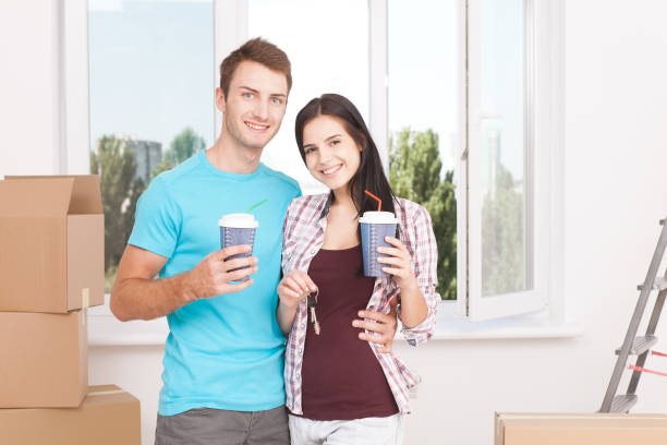 istock couple at their new empty apartment 1094117396
