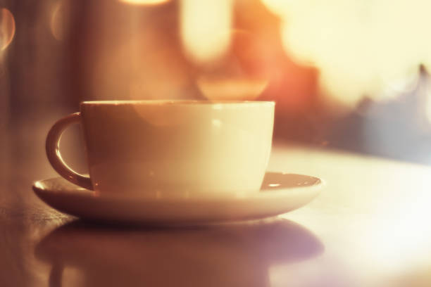 istock Sepia toned image of a coffee cup with nice bokeh at the background 1094118726