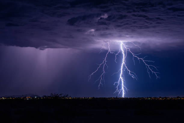 lightning bolt strike from a storm. - summer landscape flash imagens e fotografias de stock