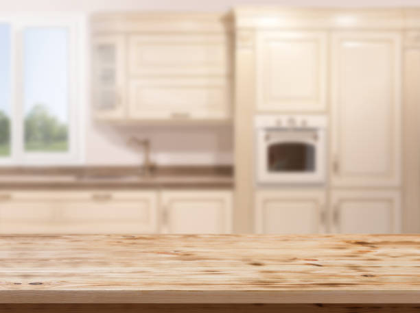 istock Wood table top on blur kitchen room background .For montage product display or design key visual layout. 1094123946
