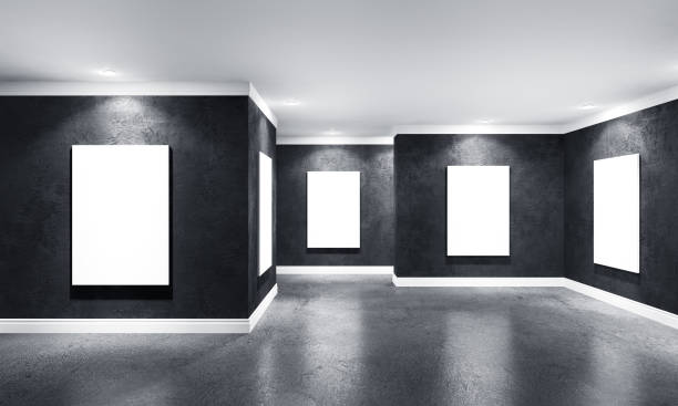 istock Modern concrete gallery room with posters on walls 1094125428