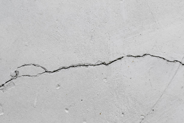 istock crack in an old concrete wall 1094125686