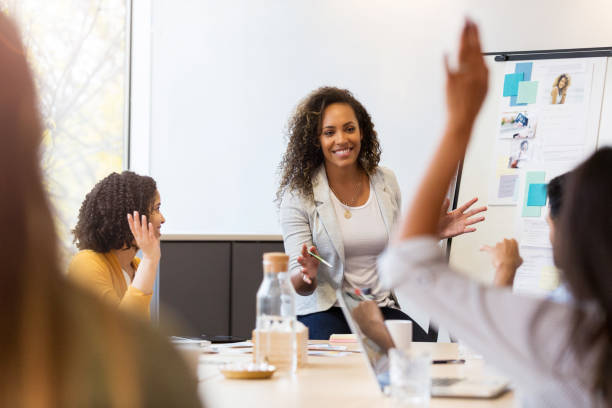 istock Cheerful manager enjoys brainstorming meeting 1094130504