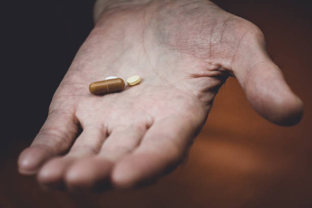 istock pills in the old hand 1094132308