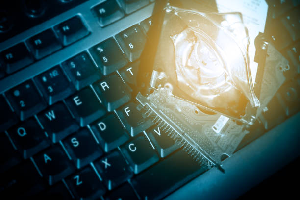 istock Computer hard drive on the keyboard, concept of hacker hacking 1094137958