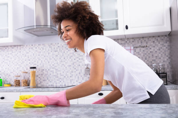 istock African Woman Cleaning Kitchen Counter 1094152972
