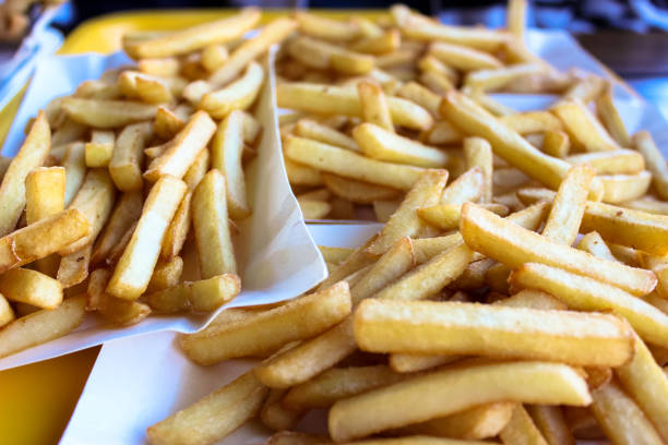 istock French fries on a paper plate in a selective focus 1094154454