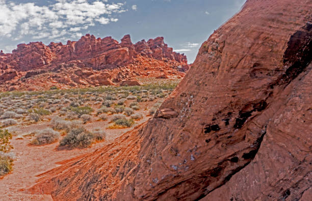 istock A huge boulder frames a scenic view in the Valley of Fire. 1094156468