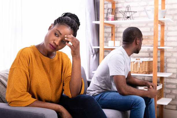 istock Upset African Couple Sitting On Sofa 1094158216