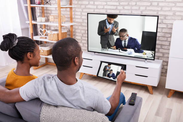 istock Couple Connecting Television Through Wireless On Tablet 1094158294