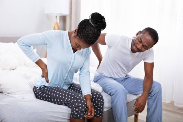 istock Couple Suffering From Back Pain 1094161150