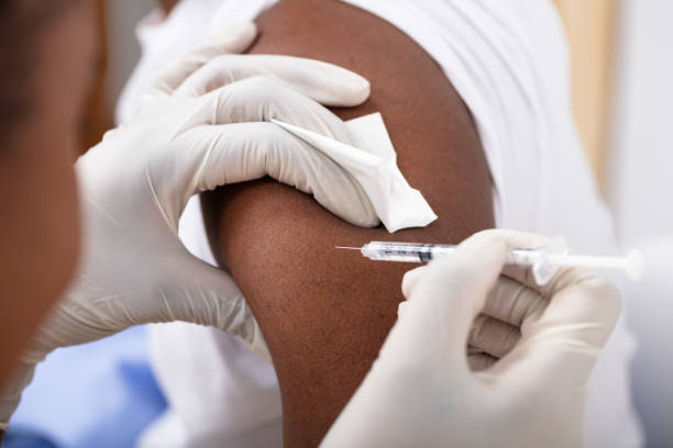 istock Doctor Injecting Syringe To Patient's Arm 1094162346