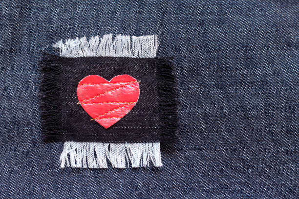 istock Patch with red heart on the jeans fabric 1094163412