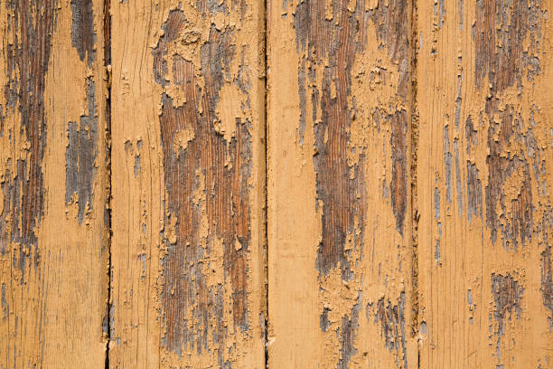 Wooden planks with peeling off paint background