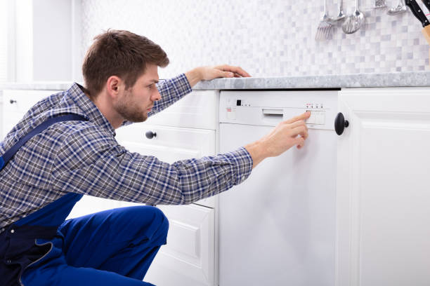 istock Man Pressing Button Of Dishwasher 1094164074