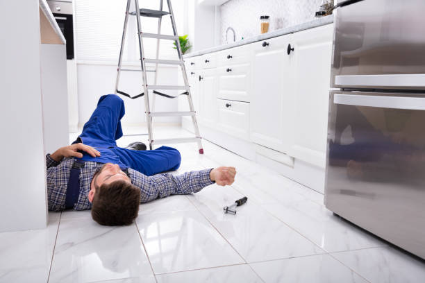 istock Unconscious Handyman Lying On Floor 1094164304