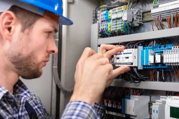 istock Technician Repairing Fuse Box With Screwdriver 1094164588