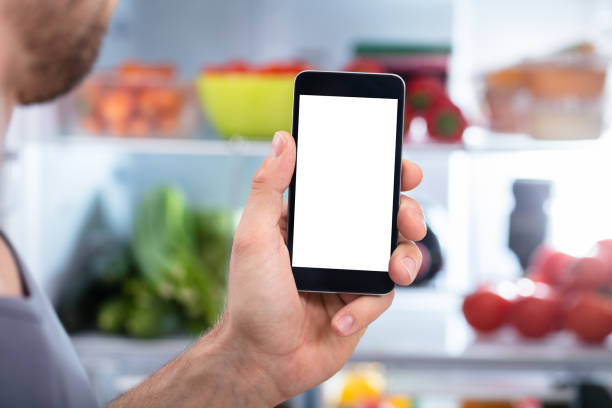 istock Person Hand Holding Mobilephone 1094164678