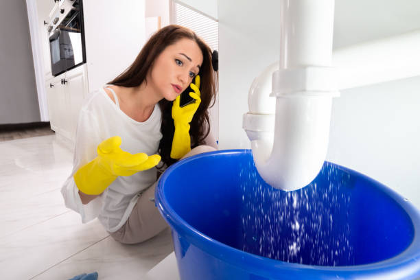 istock Woman Calling Plumber To Fix Sink Pipe Leakage 1094168336