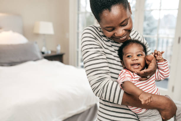 istock mom and newborn baby 1094171466