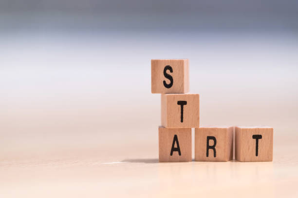 istock wood cubes with the word start on it 1094189728