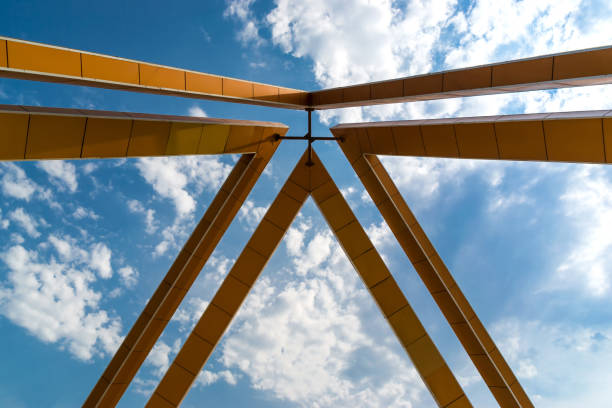 istock metal framing against a blue sky.Fragment. 1094195086