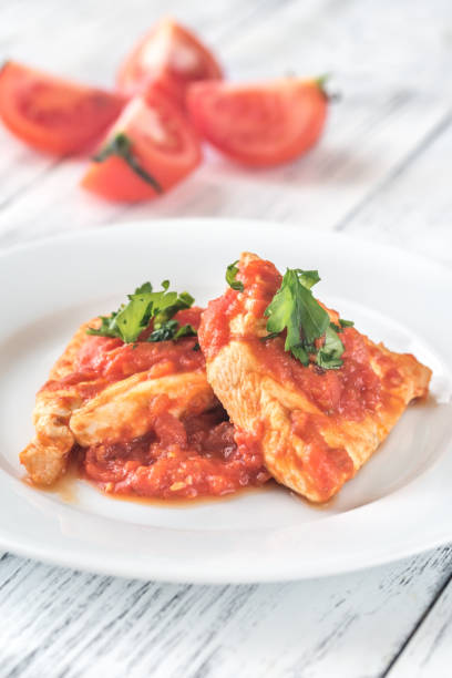 istock Chicken in tomato garlic sauce 1094198016