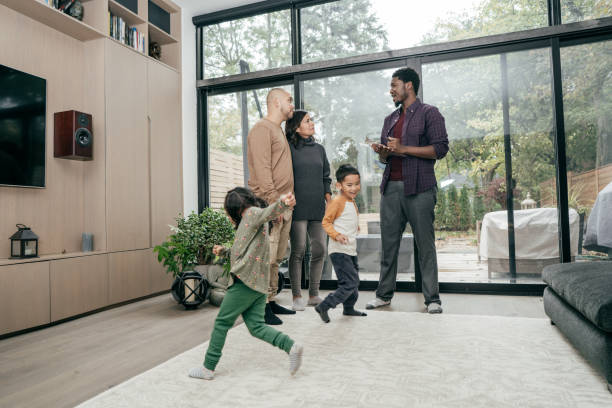 istock Multiracial family getting home consultation 1094210532