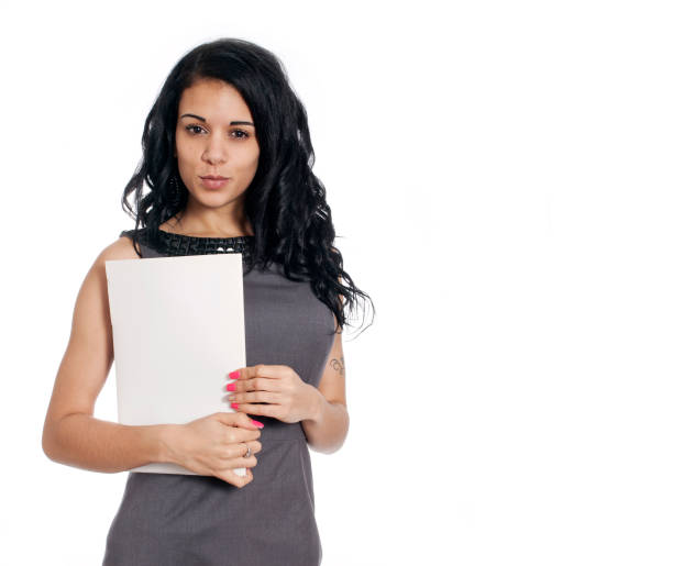 Young business woman holding a folder stock photo