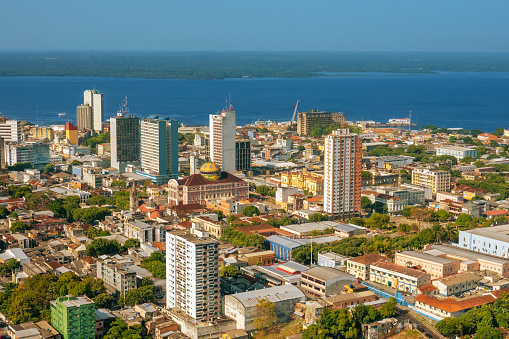 Main urban, financial and industrial center of the Amazon region\nLocated at the border of Negro River\nAmazonas Theater in the middle of the photo
