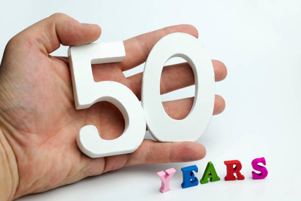 istock Hand holding number fifty. 1094219036