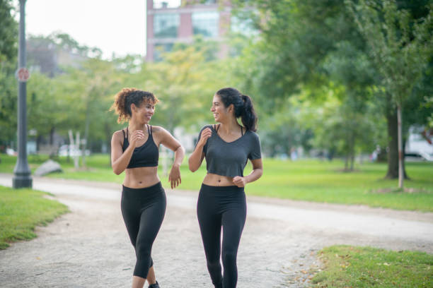 istock Women running through a park 1094219858