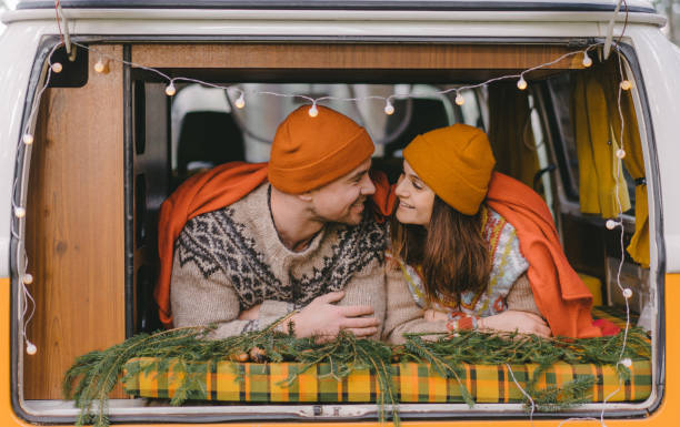 istock Couple kissing in vintage camper van 1094223020