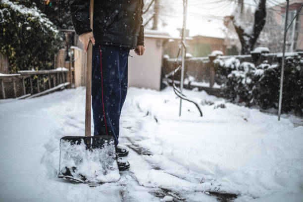 istock Senior man taking a break from shoveling the snow from his backyard 1094226076