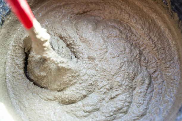 istock mixture of plaster in a bucket with a whisk 1094240978