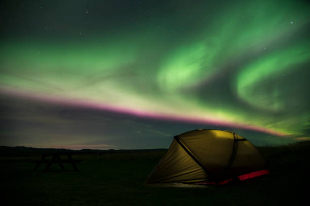 istock Aurora Borealis Northern Lights Iceland and illuminated tent 1094241034
